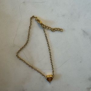Brand New “E” gold bracelet